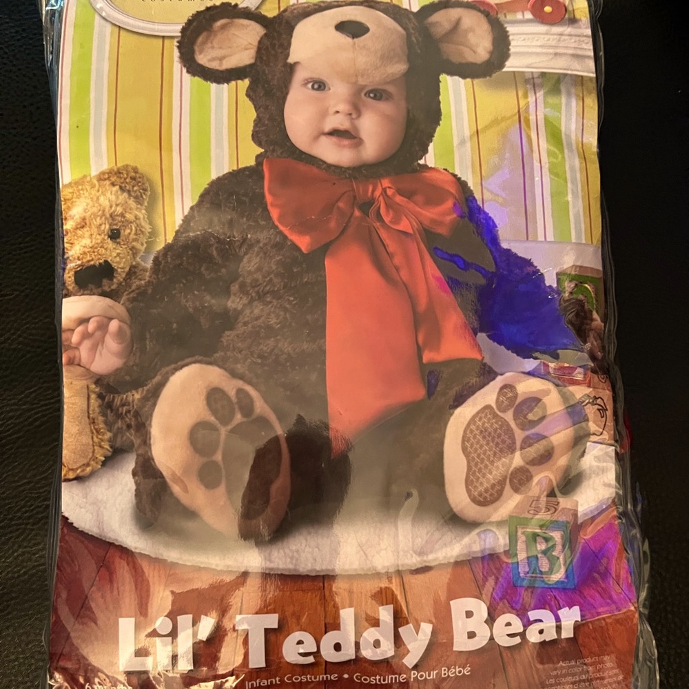 Teddy bear costume for infants 6 to 12 months open but never worn.
